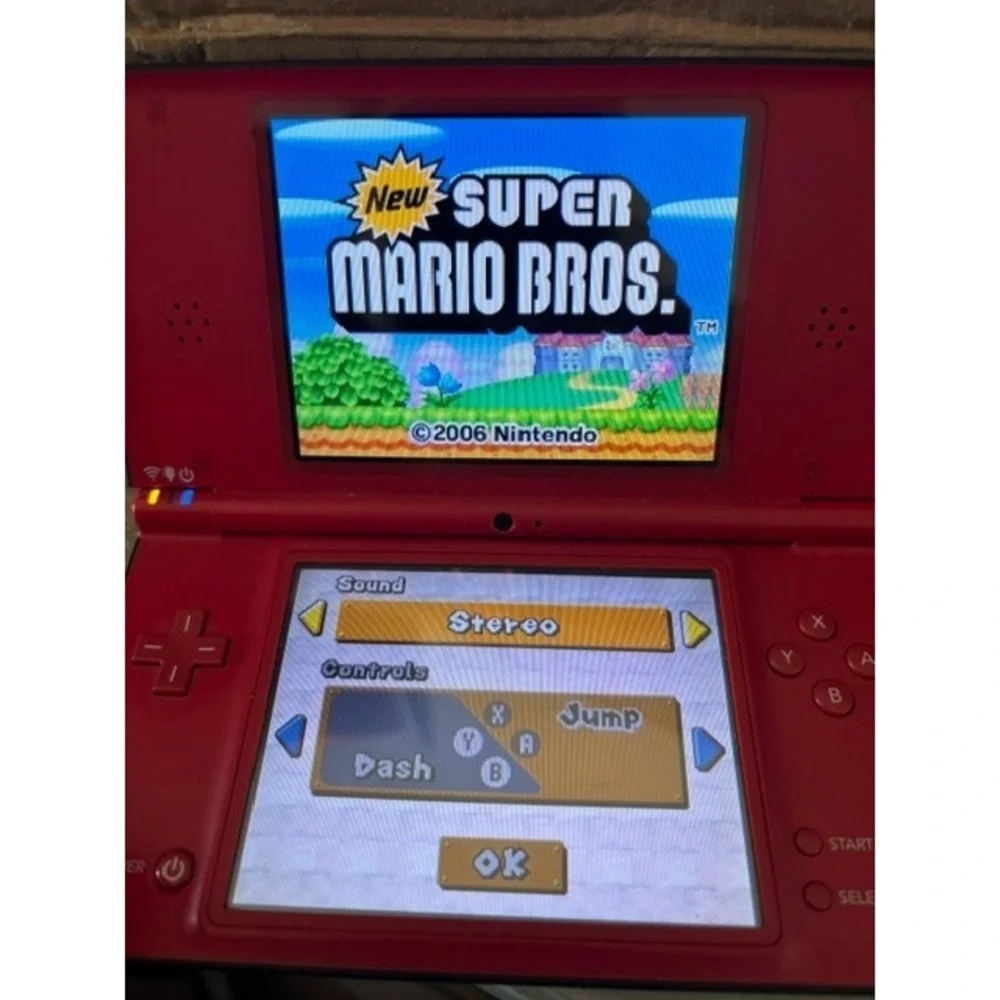 Red Nintendo DSi XL 25th Anniversary Edition Bundle With Super Mario Bros!